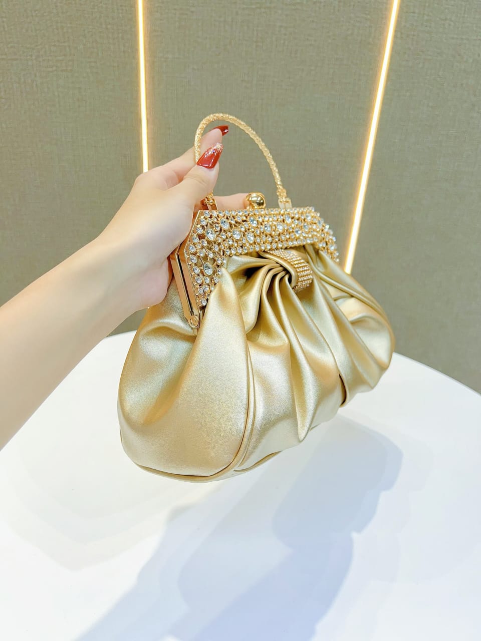Golden party wear clutch bag