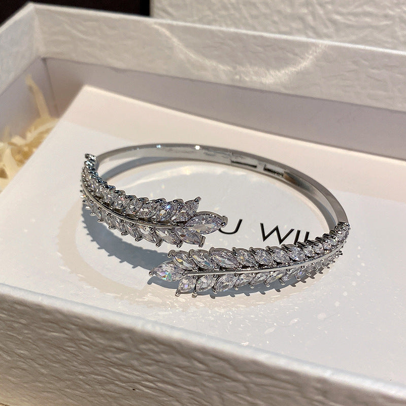 Luxury Silver-Toned Crystal Leaf Bracelet – Adjustable Party Wear Bangle for Women