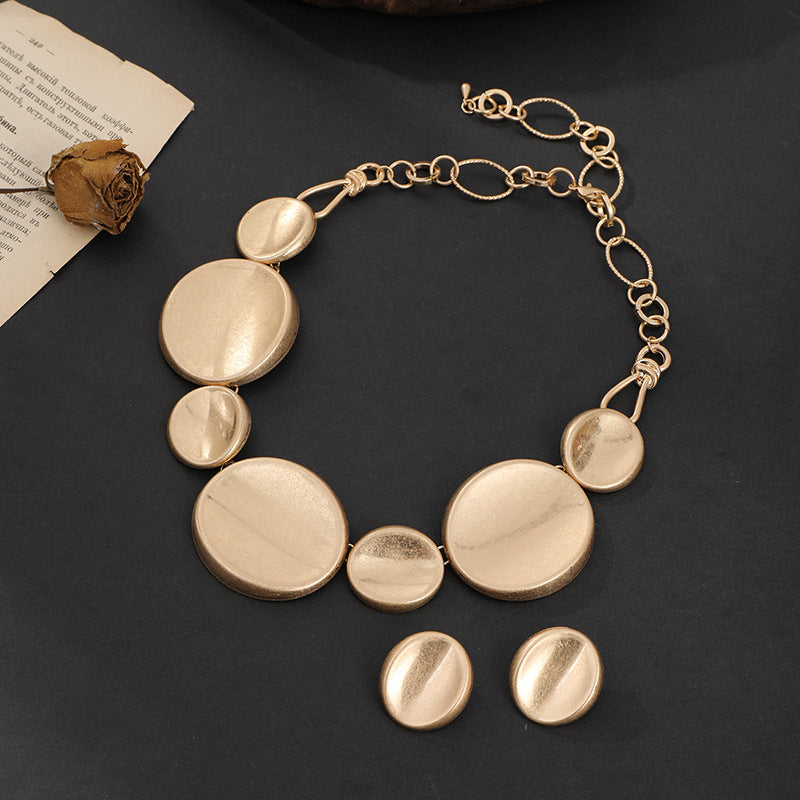 Gold-Toned Multi-Disc Statement Necklace & Earring Set