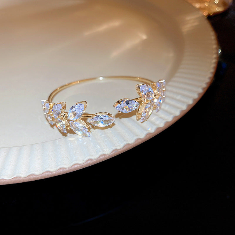 Elegant Gold-Plated Leaf Design Crystal Bracelet – Adjustable Party Wear Jewelry for Women