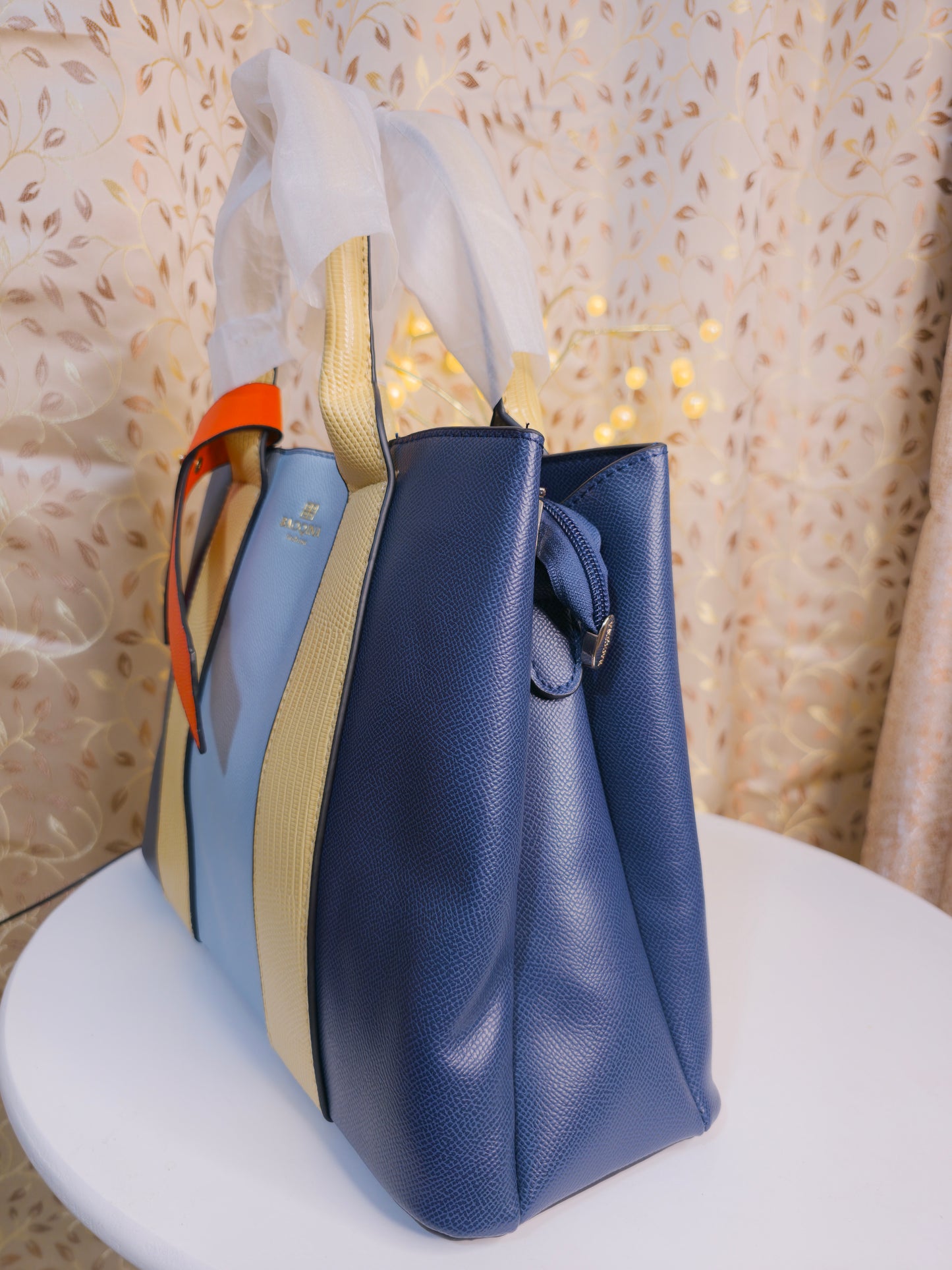 Dual color stripped designer hand bag with additional two pouch/purse inside.