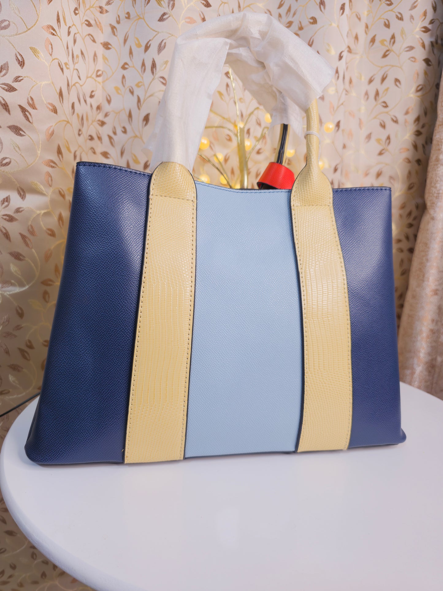 Dual color stripped designer hand bag with additional two pouch/purse inside.