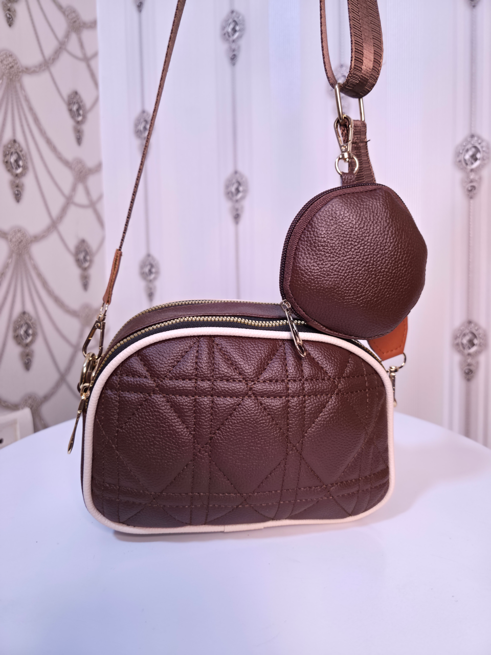 Broad sling sling bag with coin pouch