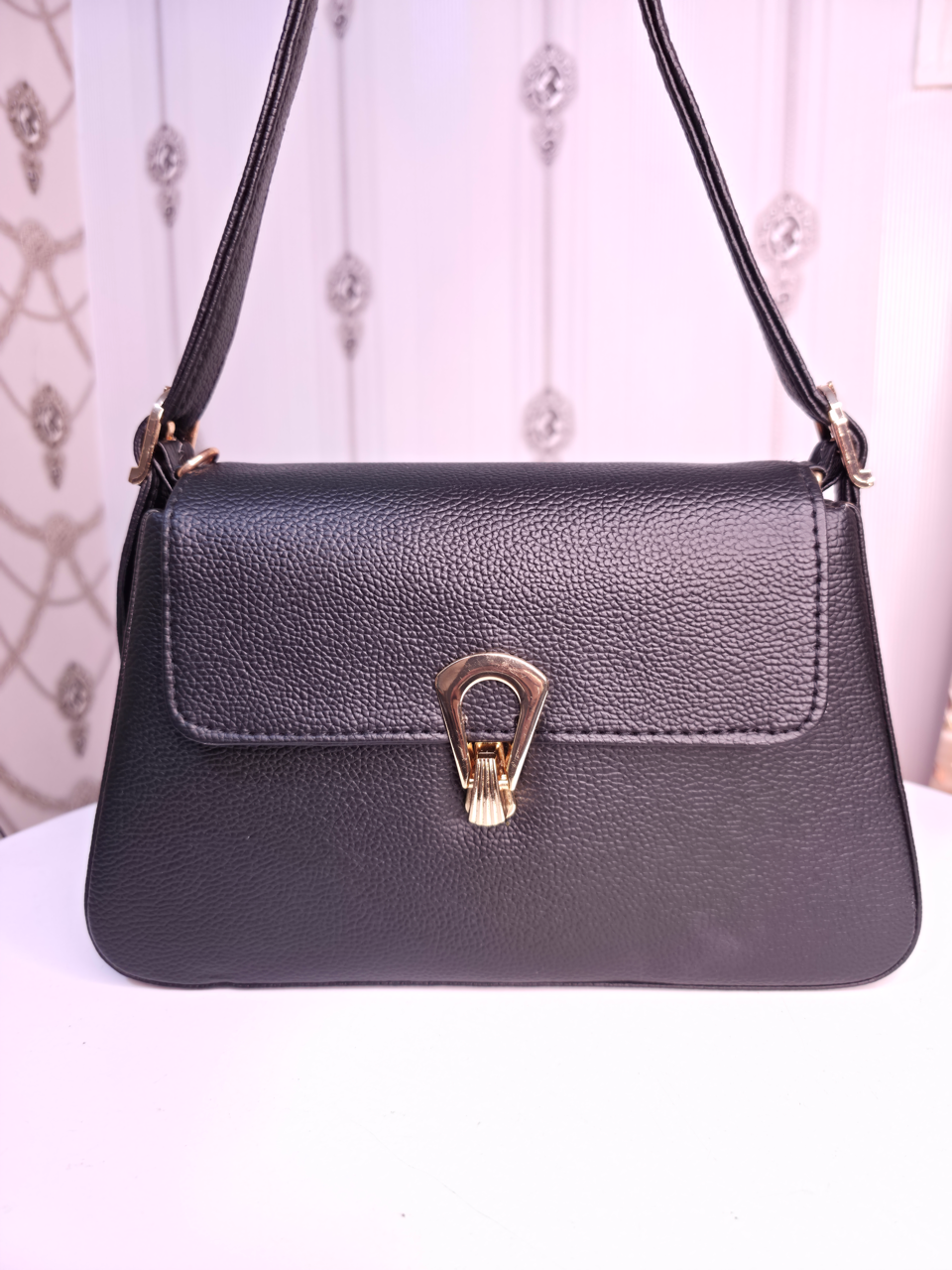 Black twisted two compartment handbag