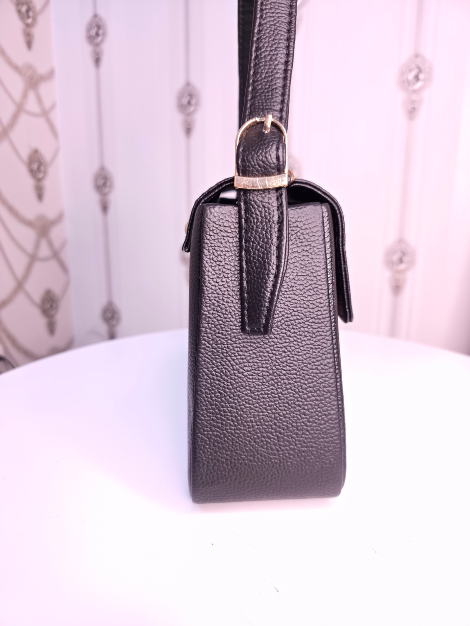Black twisted two compartment handbag