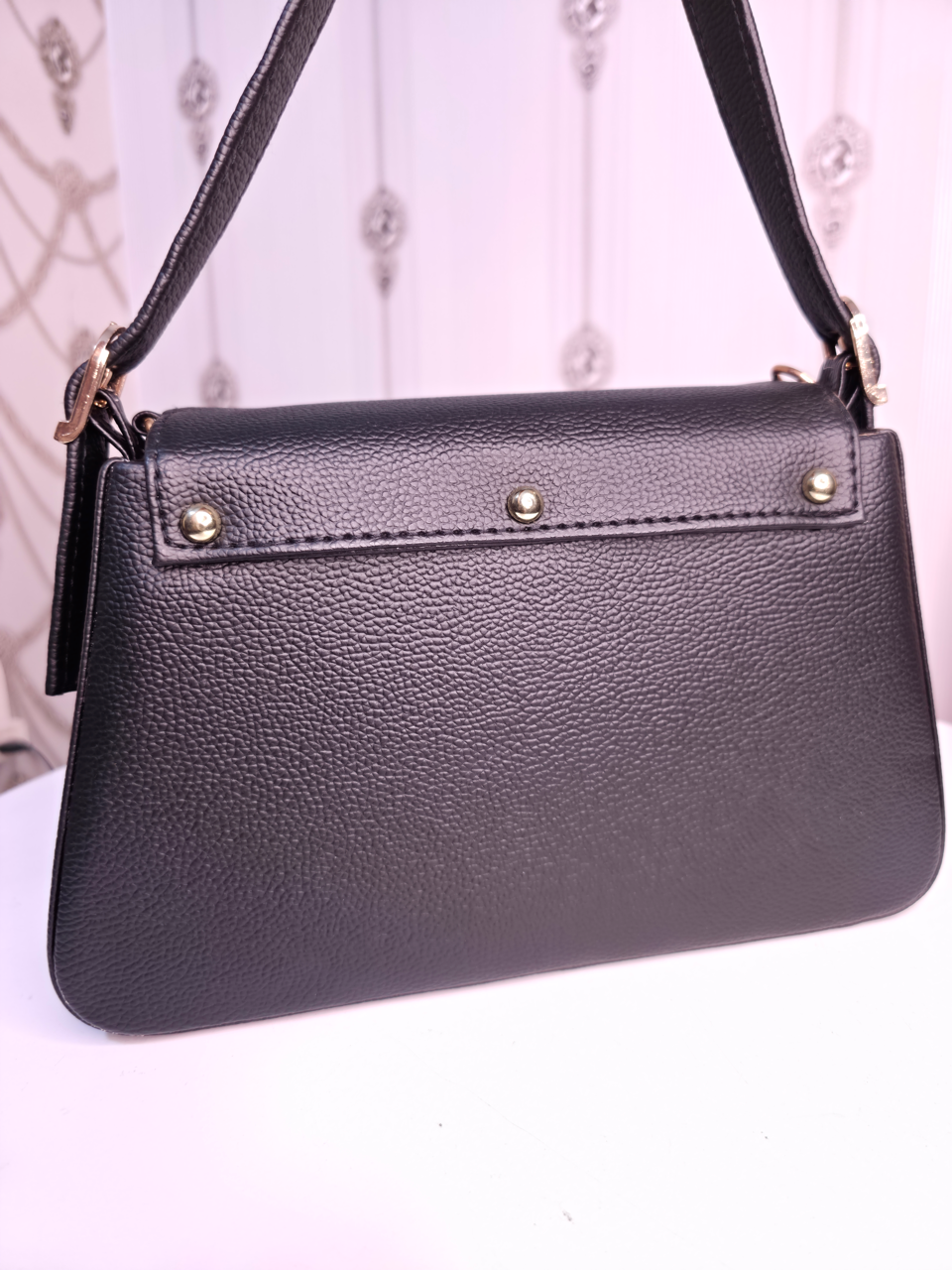 Black twisted two compartment handbag