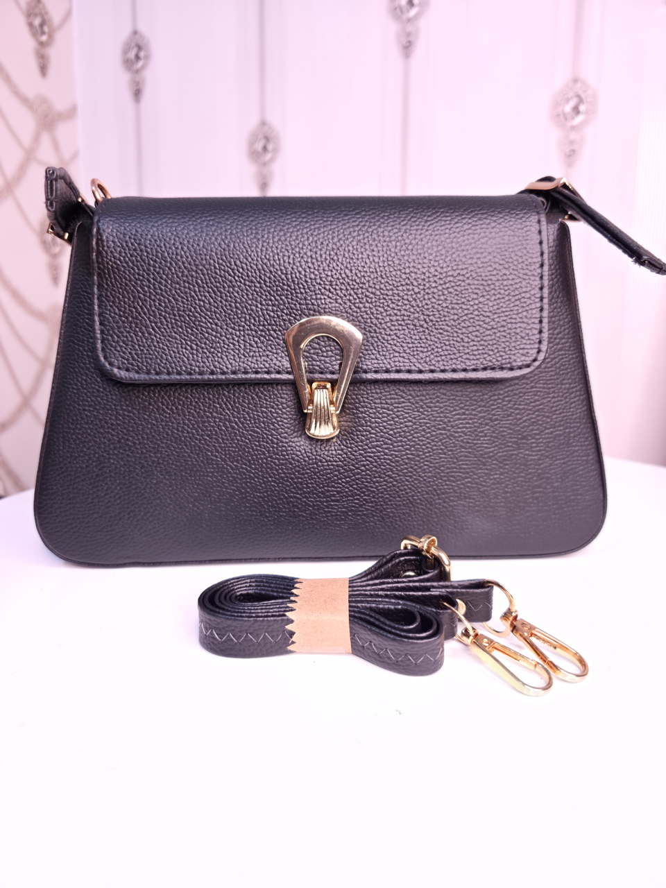 Black twisted two compartment handbag