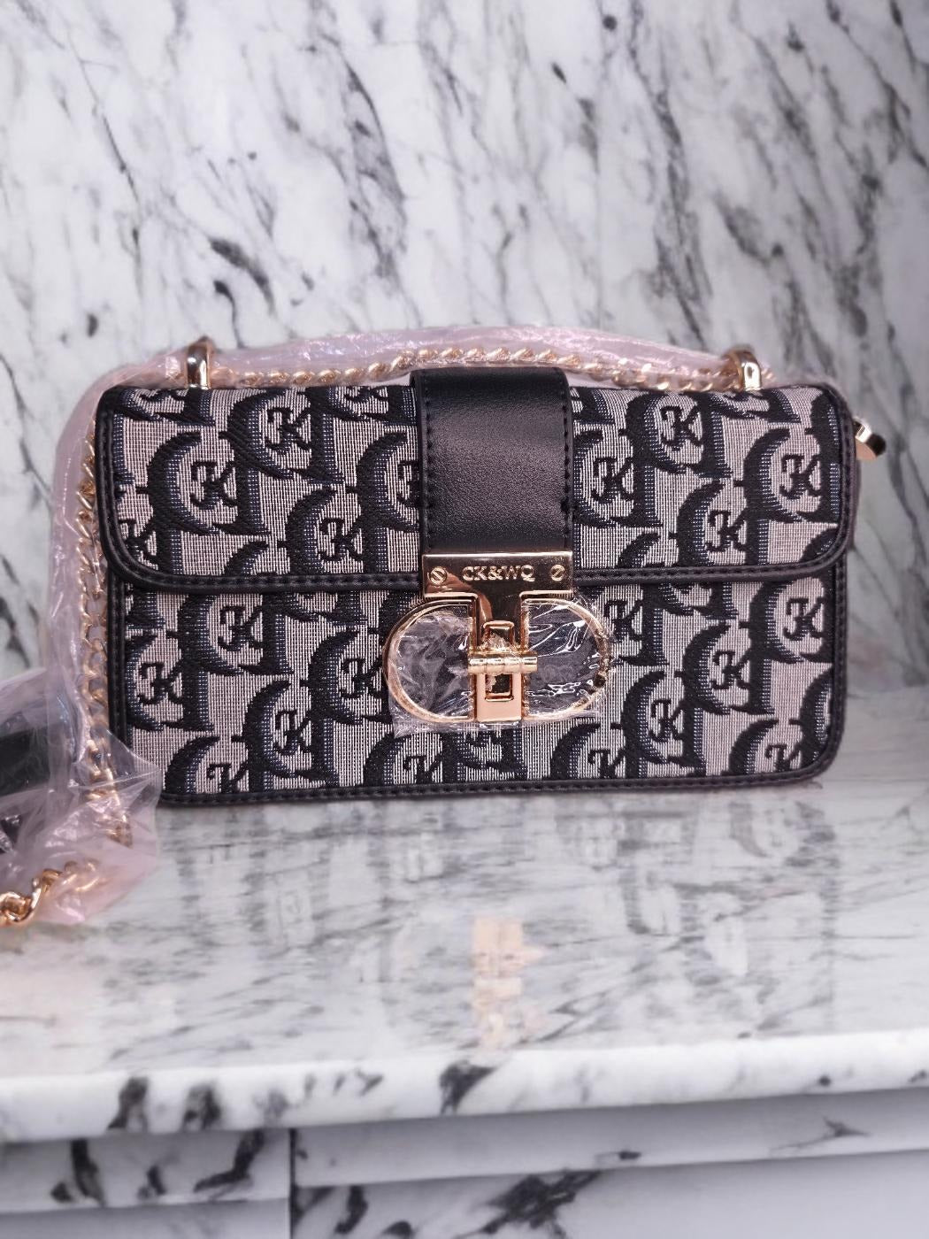 Black designer shoulder cum sling bag