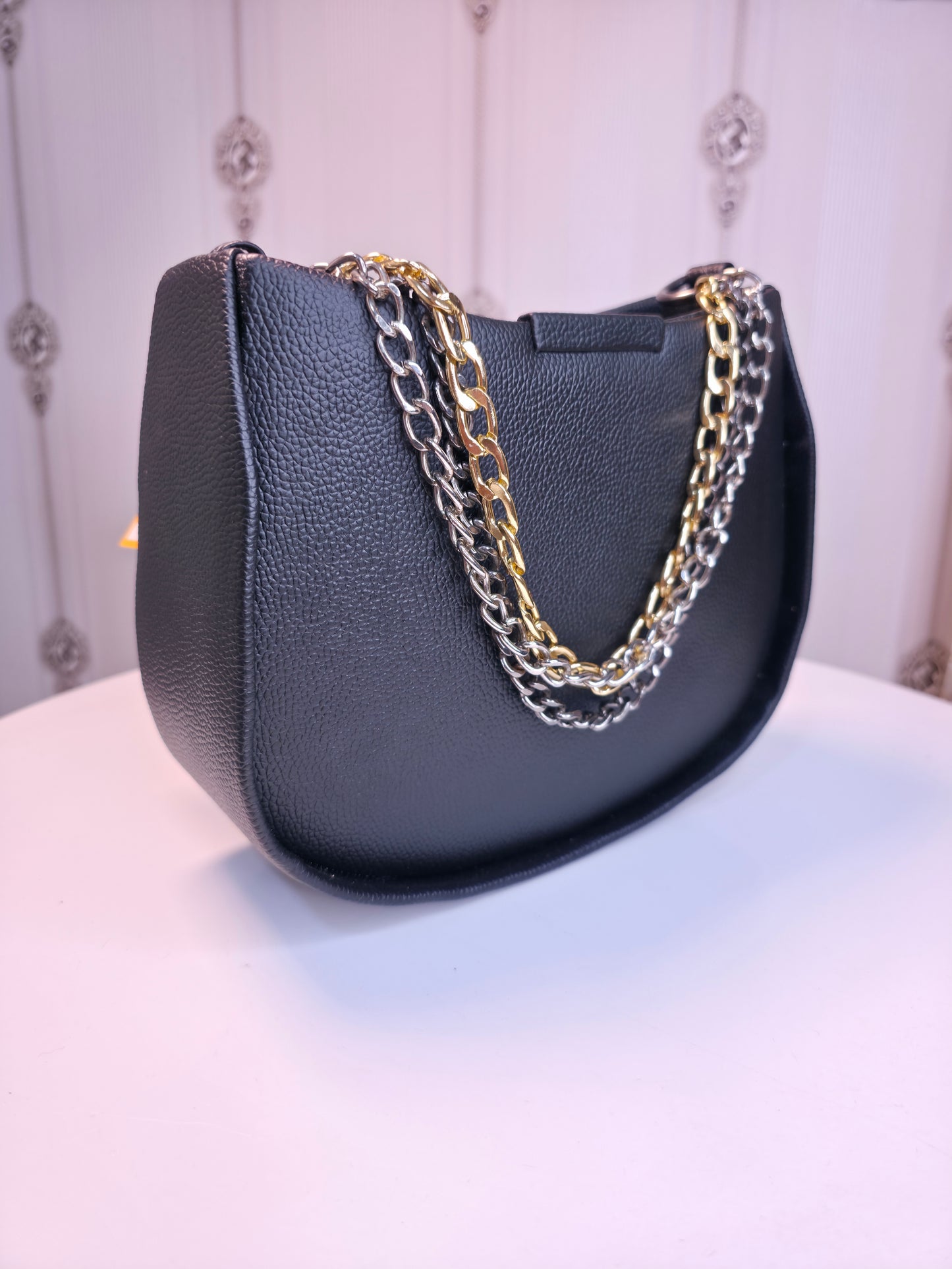 Black shiny handbag