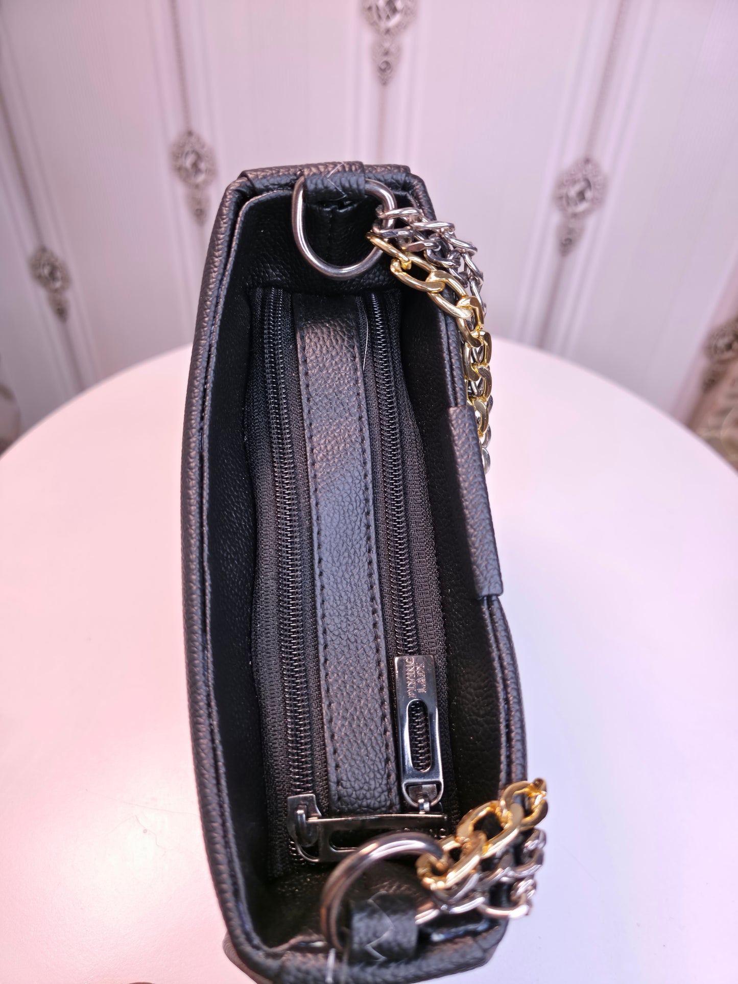Black shiny handbag