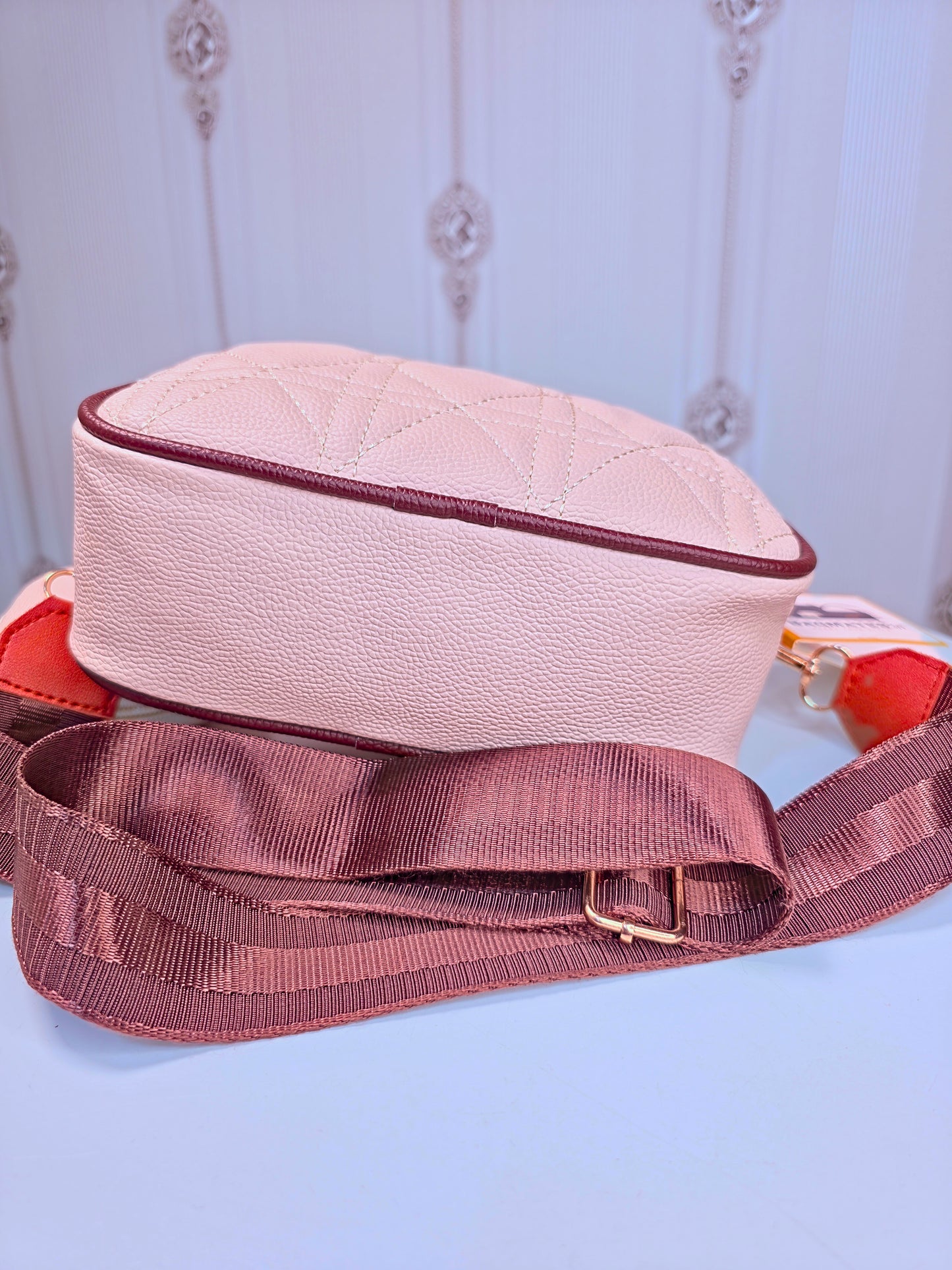 Broad sling sling bag with coin pouch