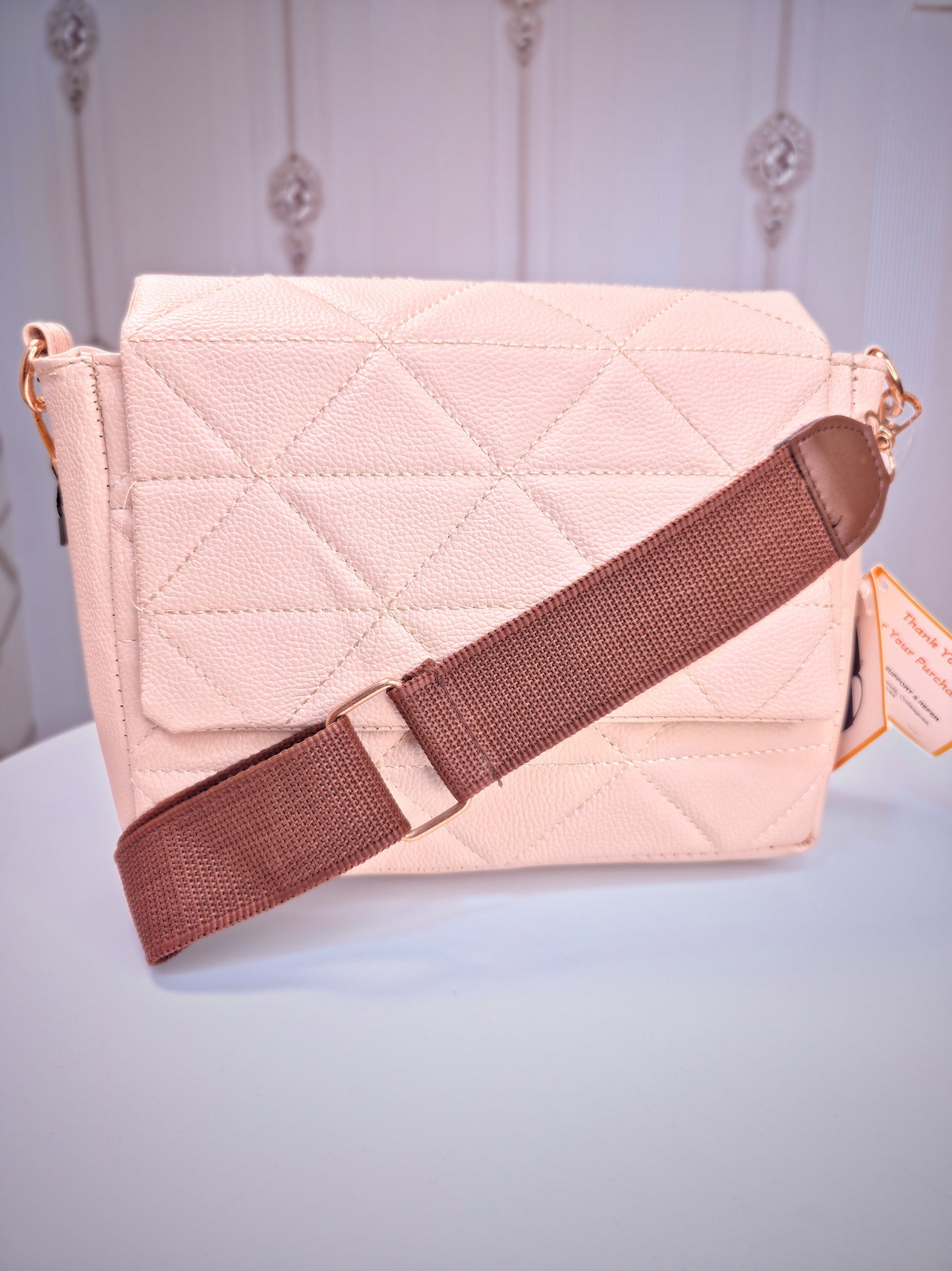 Broad sling soft leather handbag