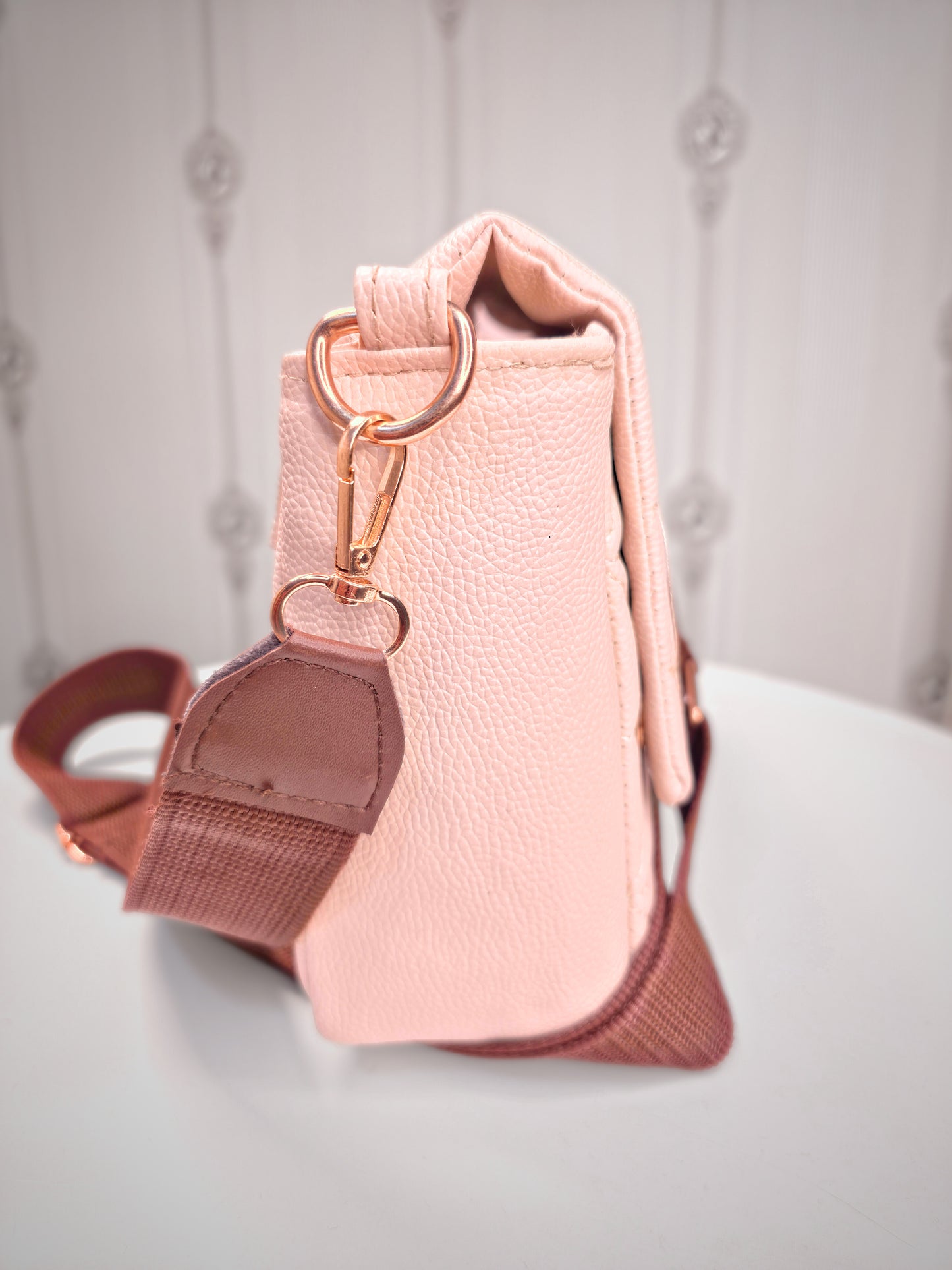 Broad sling soft leather handbag