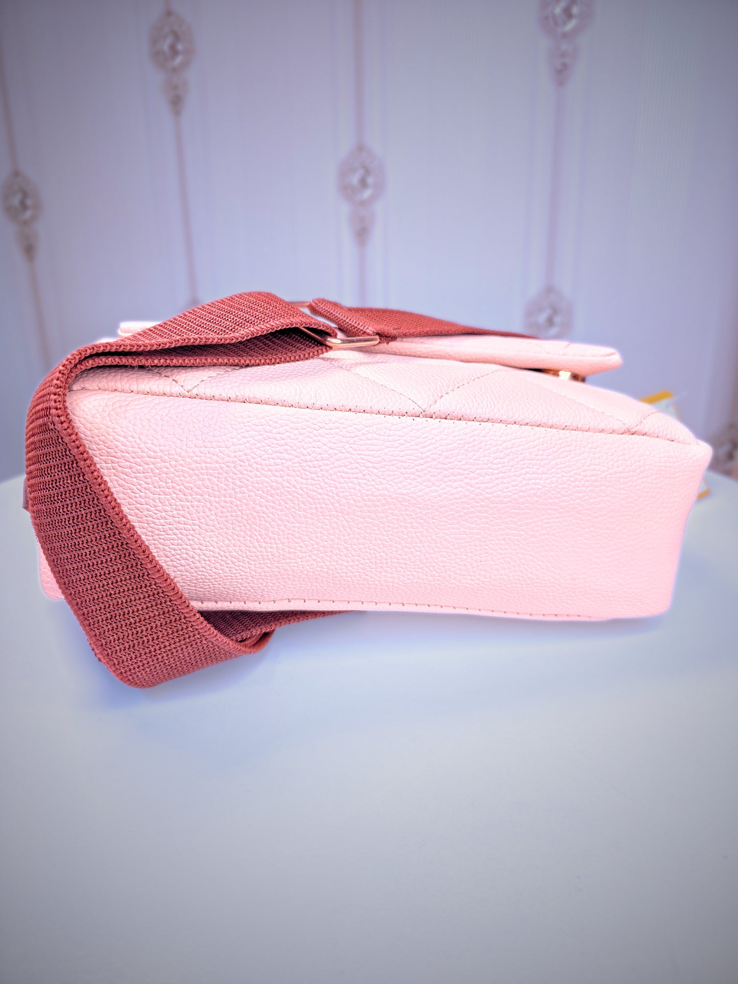 Broad sling soft leather handbag