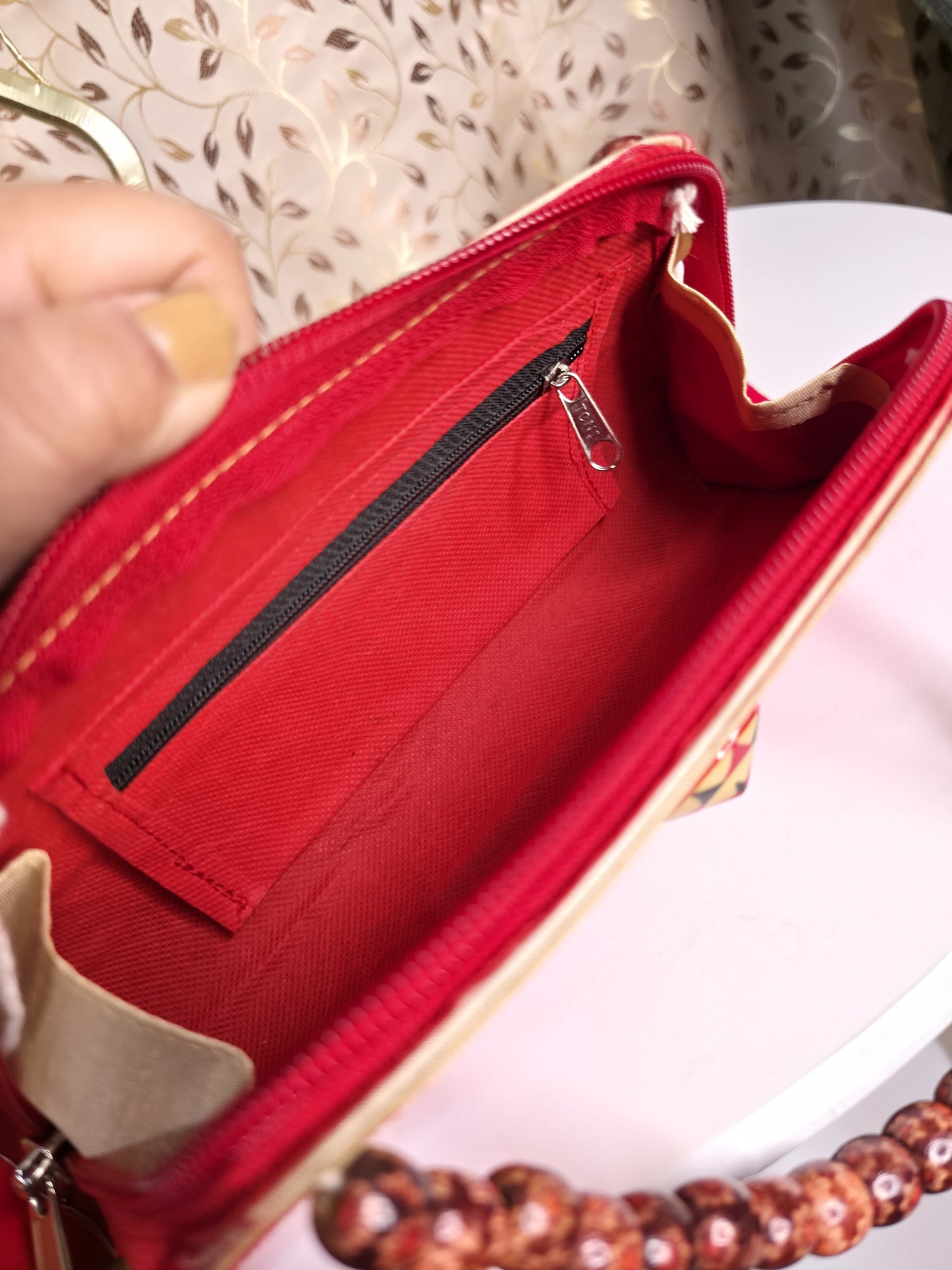 Traditional triangled japi clutch bag