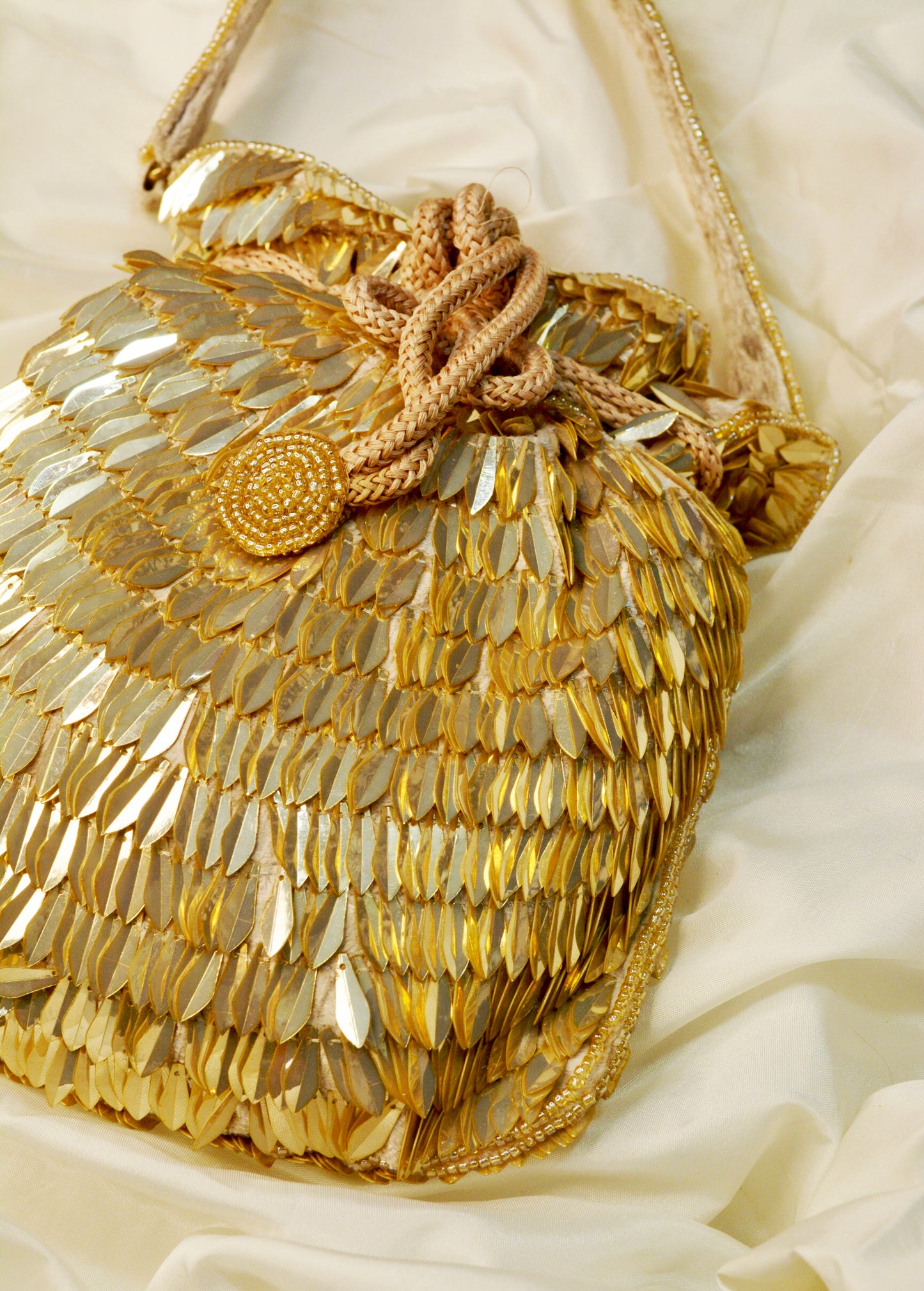 sequenced leaves assorted party wear potli