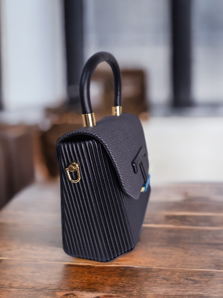 Designer sling hand bag