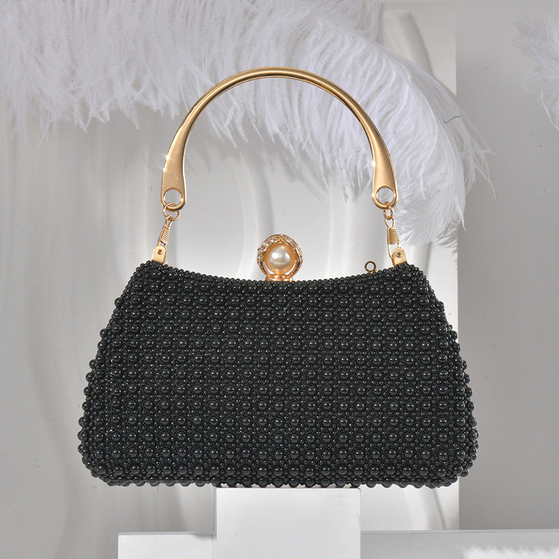 Pearl/beads handled party clutch