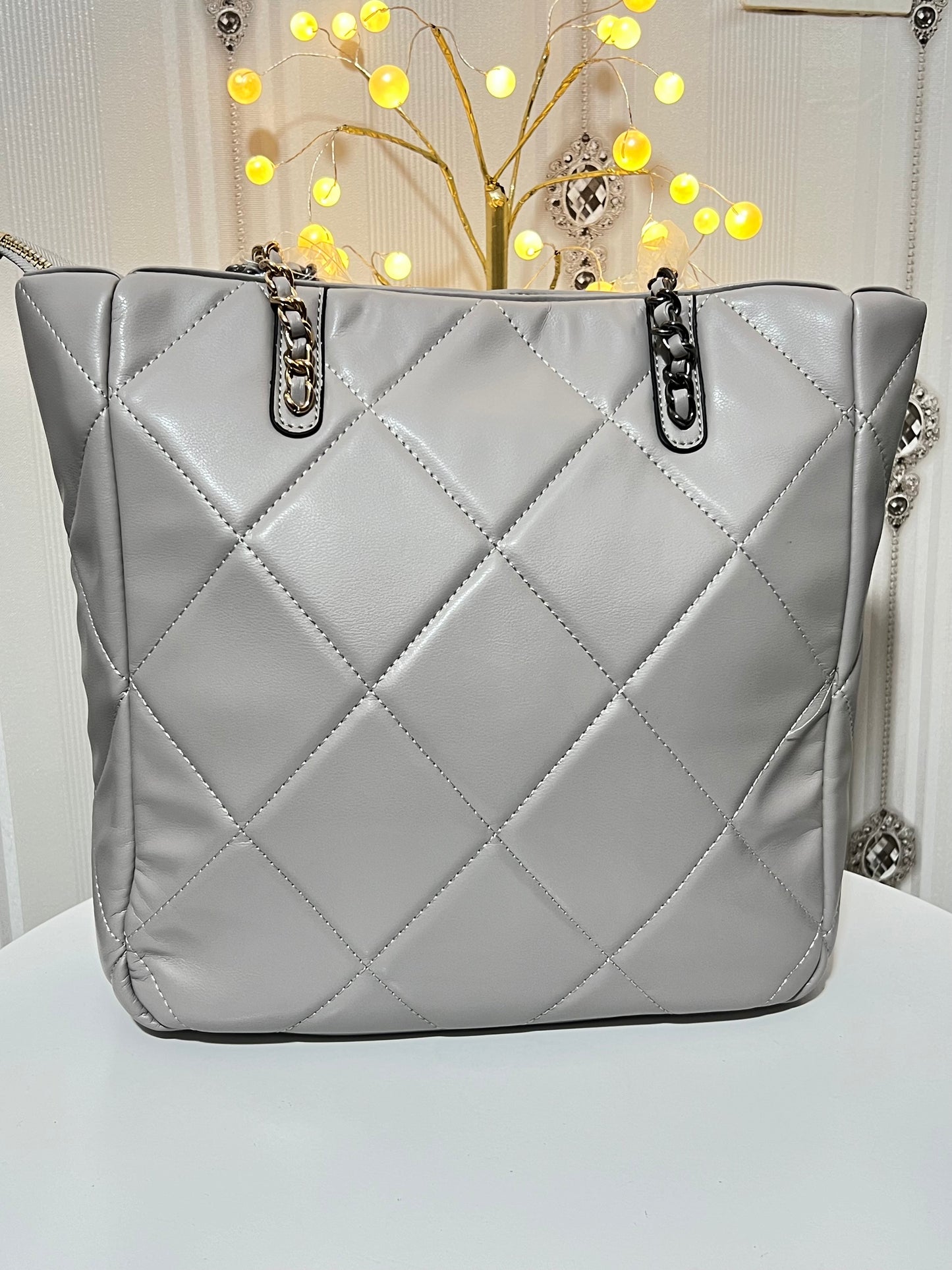 Quilted large handbag with metallic sling