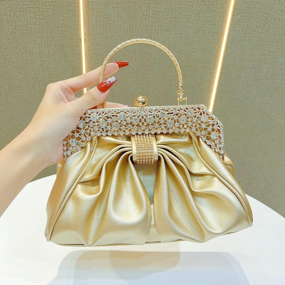 Golden party wear clutch bag