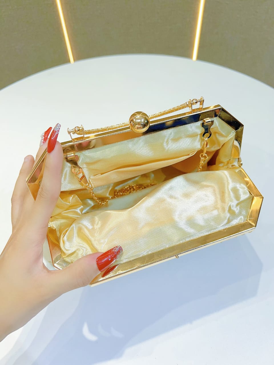 Golden party wear clutch bag