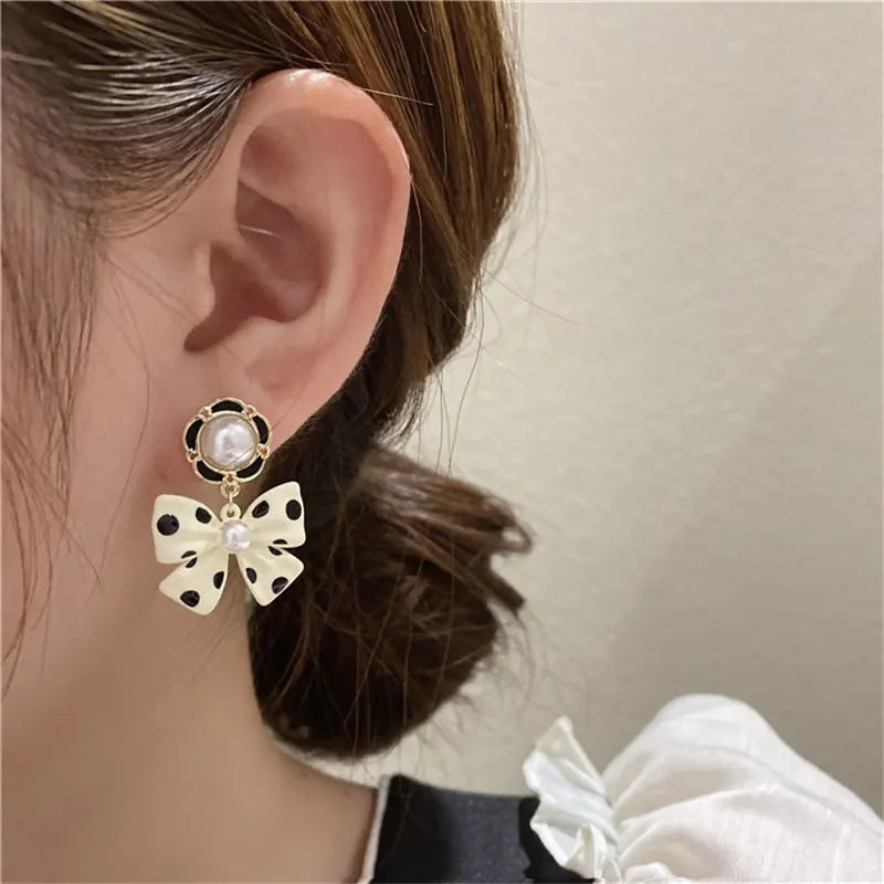 Chic Polka Dot Bow Earrings with Pearls - Stylish and Playful