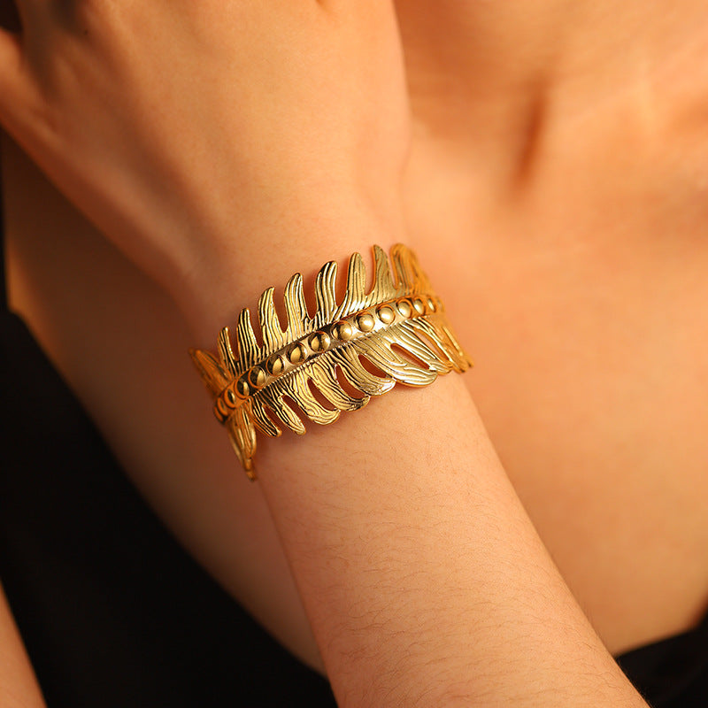 Gold-Toned Leaf Design Cuff Bracelet – Elegant Statement Bangle for Women