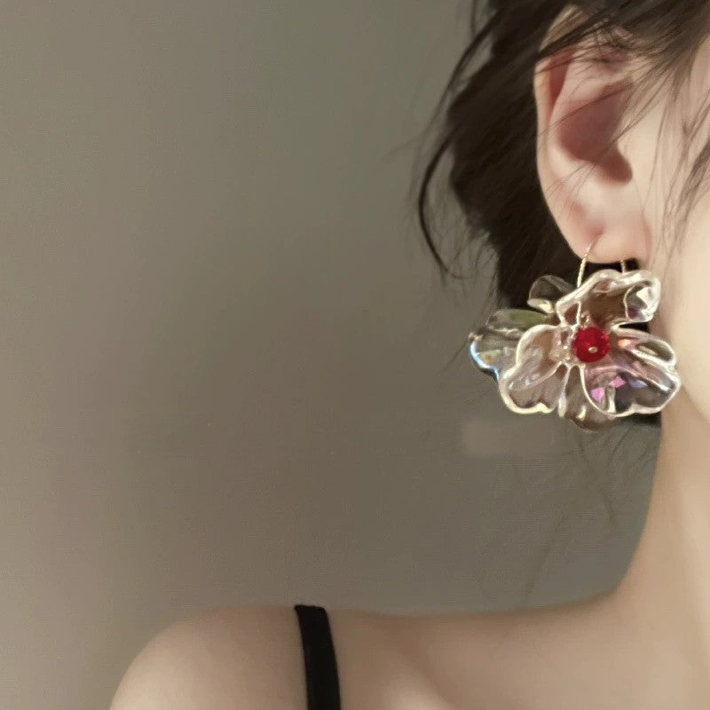 Transparent Floral Earrings with Red Gem Accents