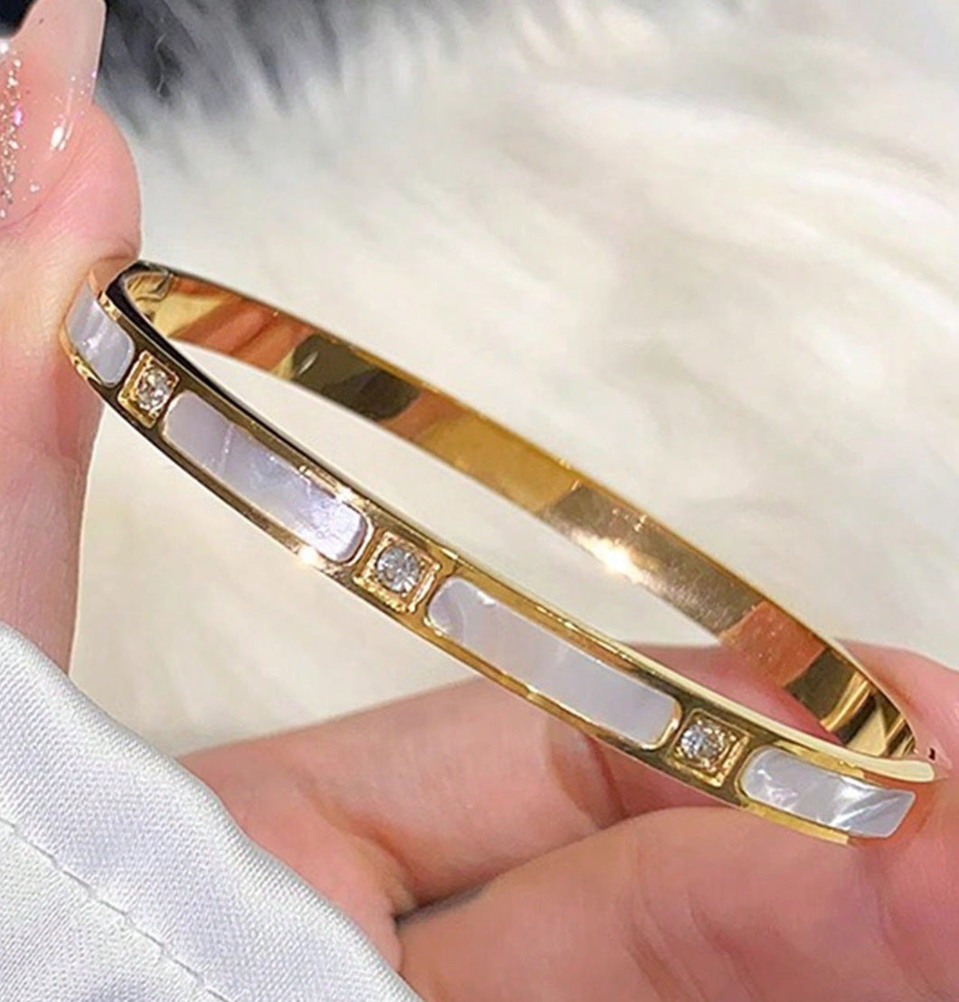 The Modern Bangle Collection: Chic Stainless Steel & Crystal Bracelets