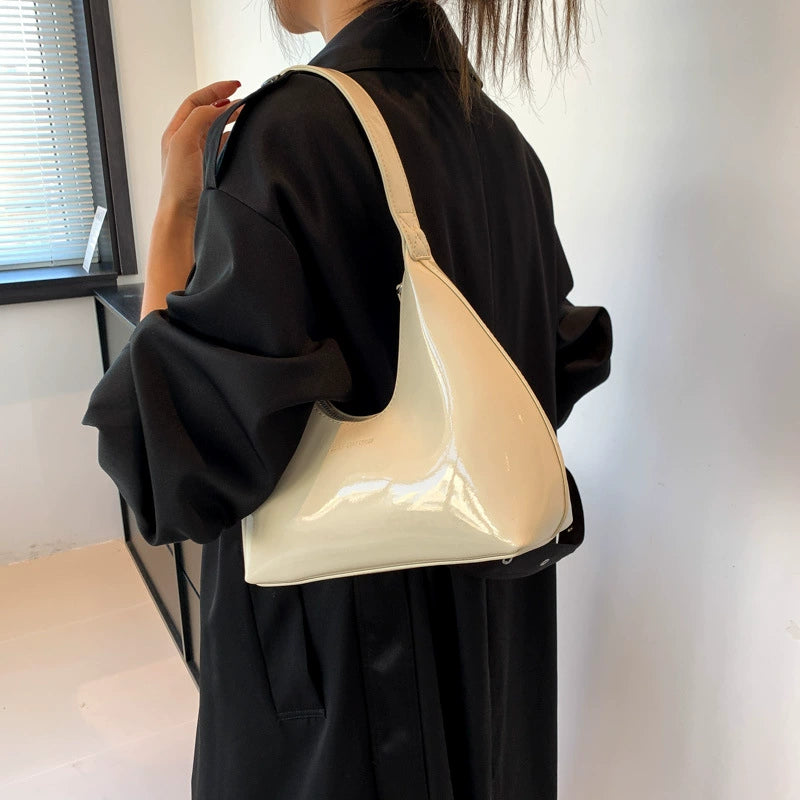 Elegant Cream Patent Leather Crescent Shoulder Bag