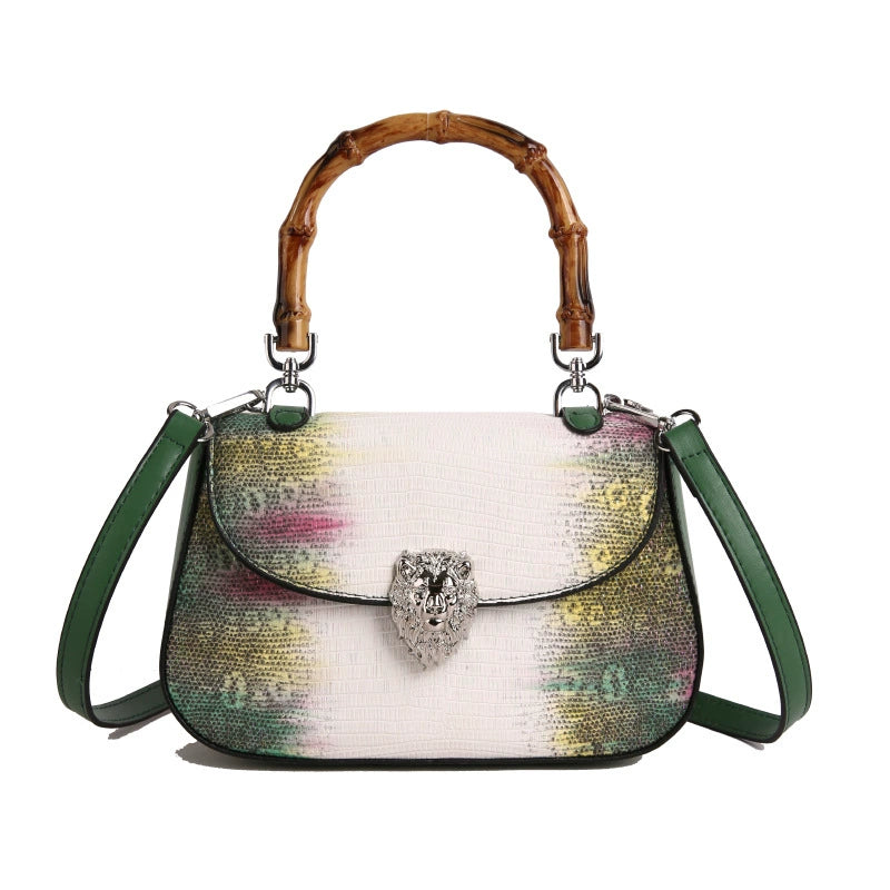 Chic Snake Print Crossbody Bag with Bamboo Handle & Lion Clasp