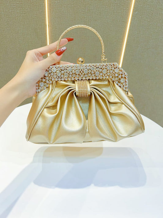 Golden party wear clutch bag