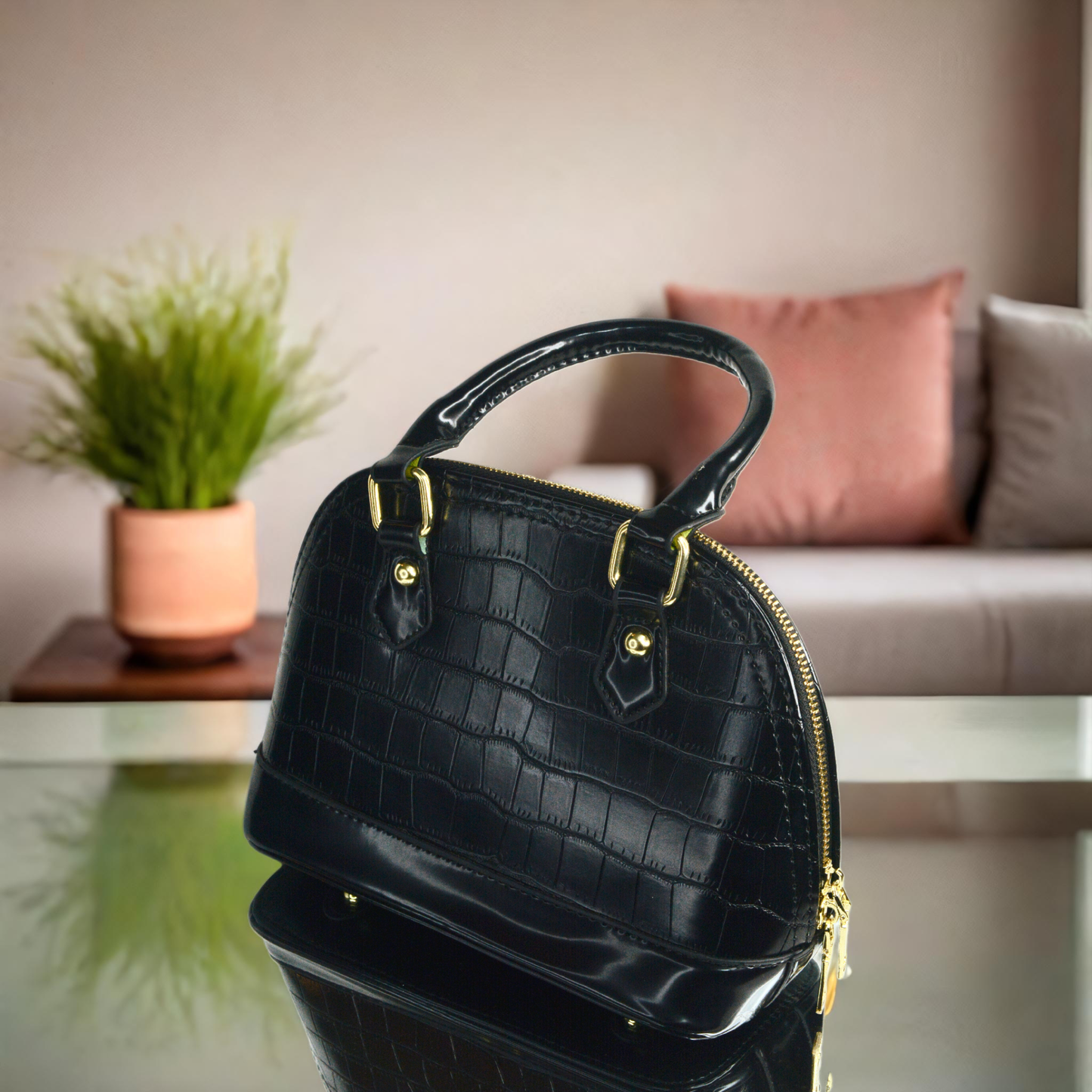 Sleek and Black medium sized handbag