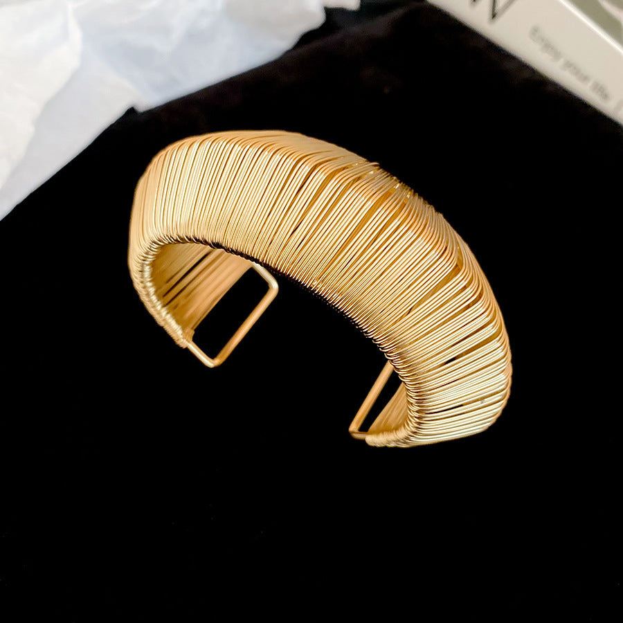 The Artisan Weave | Sculptural Spun Gold Statement Cuff