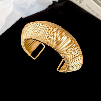 The Artisan Weave | Sculptural Spun Gold Statement Cuff