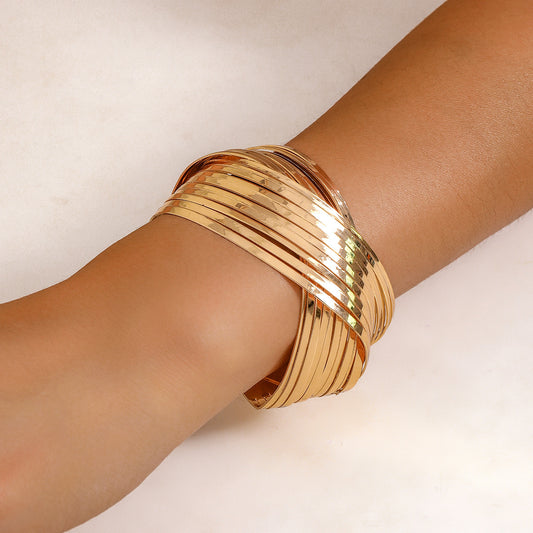 Elegant Gold Intertwined Wide Cuff Bracelet
