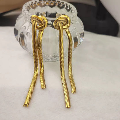 The Serpentine Knot Statement Earrings | Sculptural Tassel Jewelry