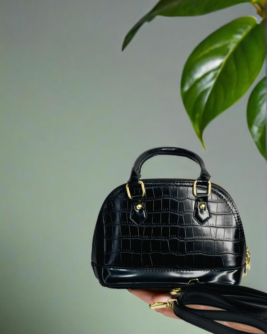 Sleek and Black medium sized handbag