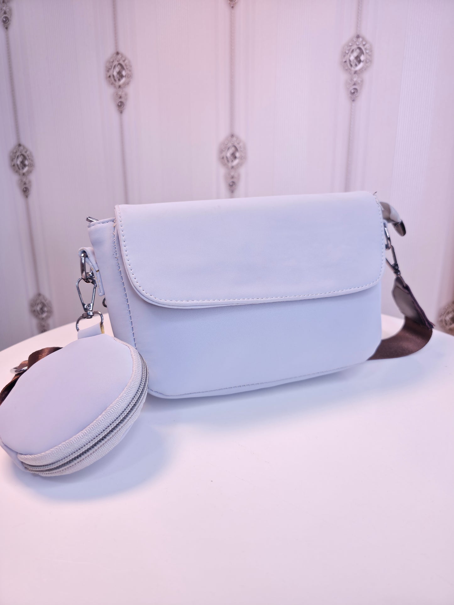 Quilted broad sling hand bag with coin pouch