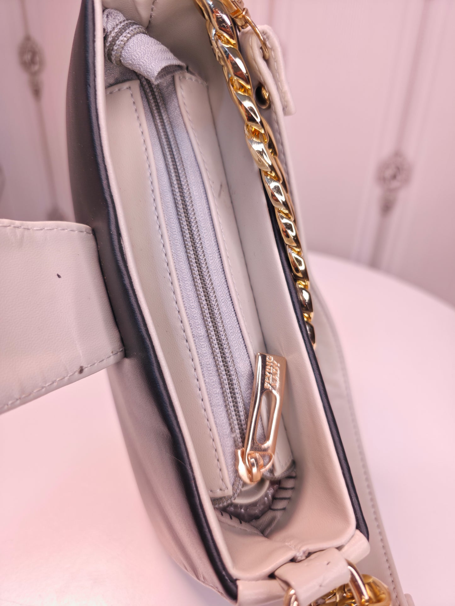 Dual toned teddy front sling bag