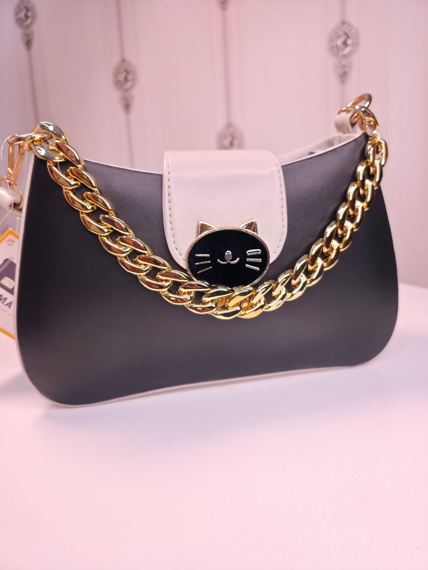 Dual toned teddy front sling bag