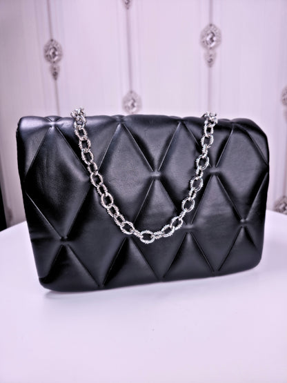 Medium sized soft quilted handbag