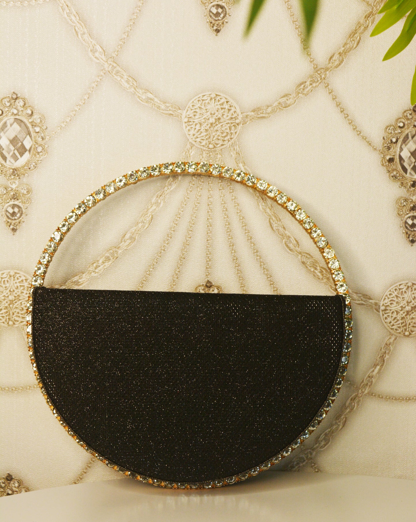 Sequence Semi circle clutch bag with stone handle
