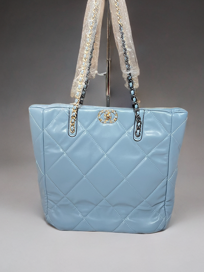 Quilted large handbag with metallic sling