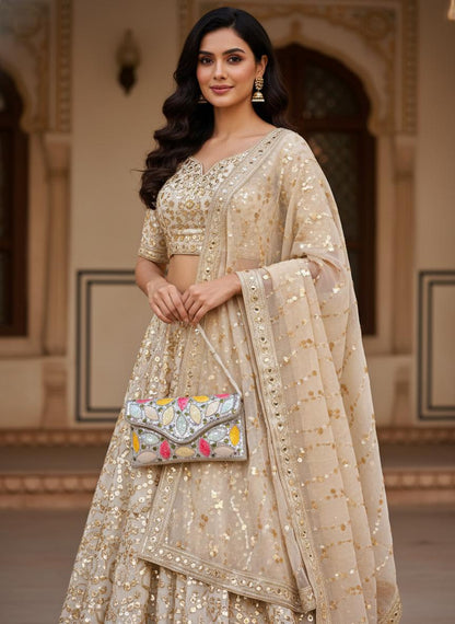 Party wear Multi coloured leaves designed stone embroidered clutch