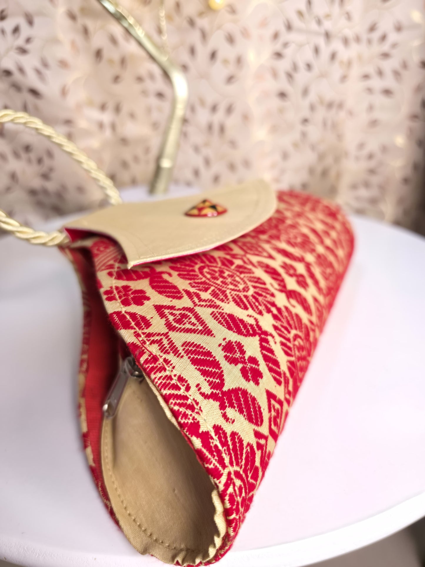 Traditional triangled japi clutch bag
