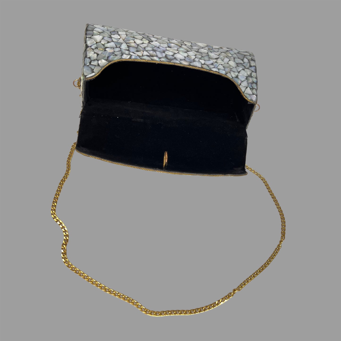 Marble finish metallic clutch