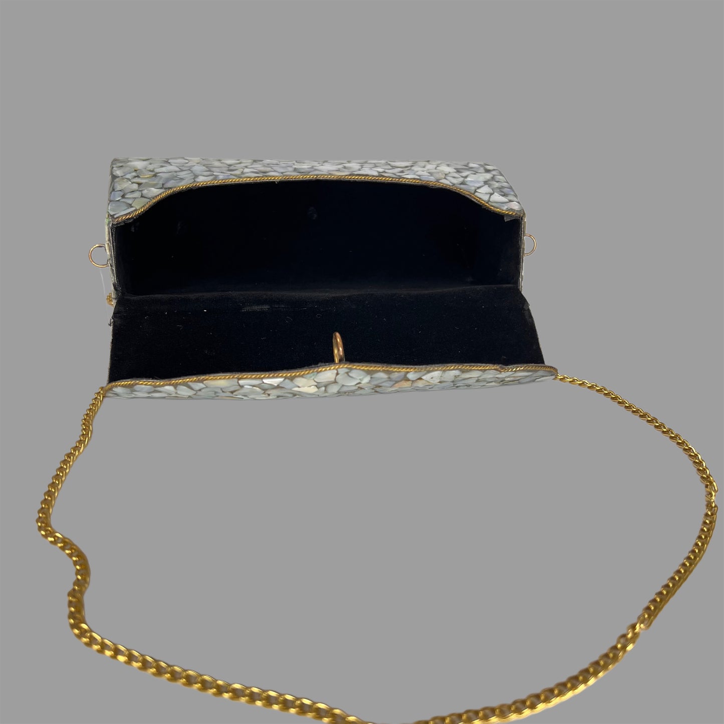 Marble finish metallic clutch