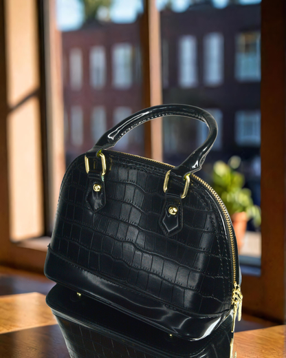 Sleek and Black medium sized handbag