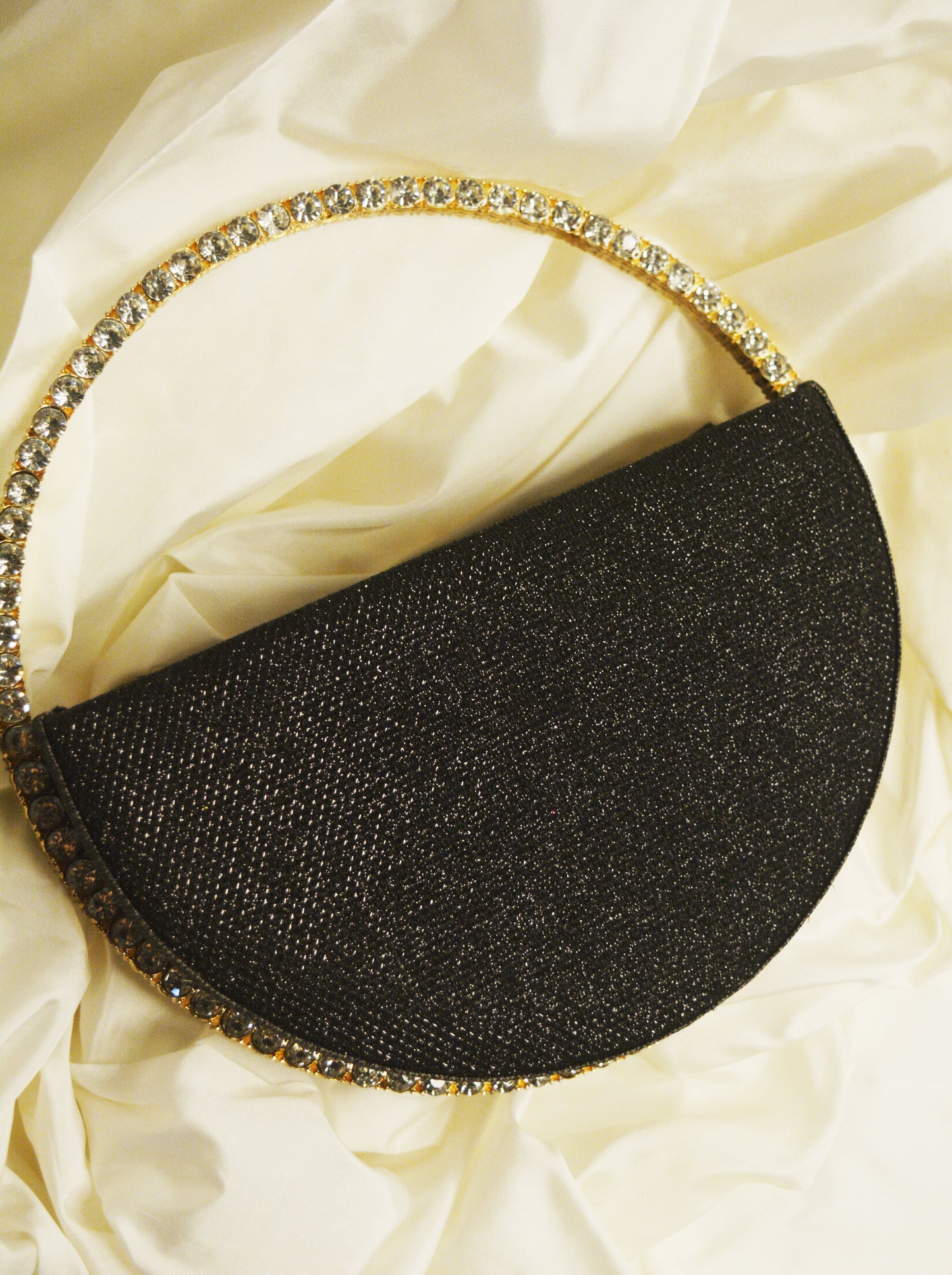 Sequence Semi circle clutch bag with stone handle